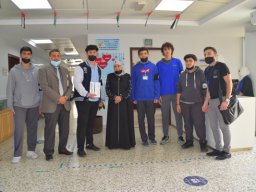 GR-12-Boys giving donation at Sharjah City for HumanitarianServices